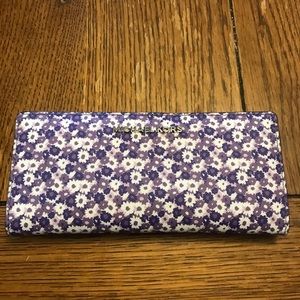 Michael Kors flower wallet w/ silver hardware
